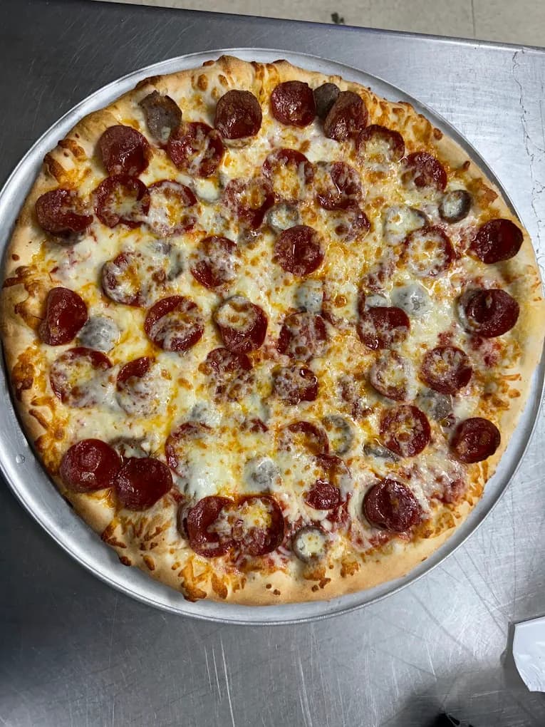 A pepperoni pizza fresh from the Elizabeth’s Pizza kitchen